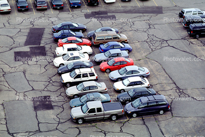 van, car, sedan, automobile, vehicle, parked cars, stalls, parking lot