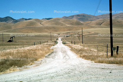 dirt road off of Hiway-33, near Mckittrick, Summer, Summertime, unpaved, hills, pumpjack