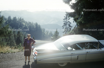 Cadillac, car, woman, sedan, fins, August 1959