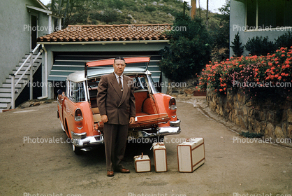 Chevy Station Wagon, luggage, Man, formal attire, suit, garage, May 1954, 1950s