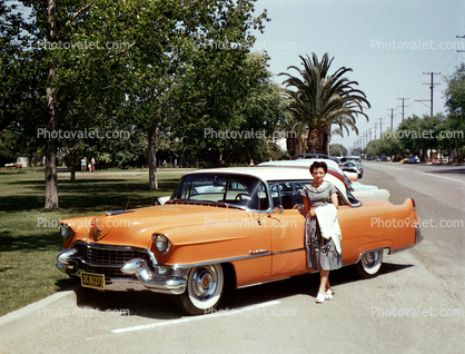 Orange Cadillac, woman, car, Dagmar Bumps, 1950s
