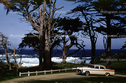 1956 Chrysler New Yorker, coast, coastline, Carmel, Monterey Peninsula, Cypress Trees, Pacific Ocean, California, 1950s