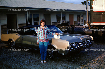 Woman and her Car, 1967 Oldsmobile Cutlass, 2-Door Hardtop, motel, July 1967, 1950s
