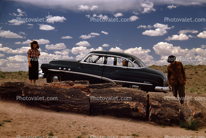 1952 Buick Super 88, Petrified Tree, Cumulus Clouds, Woman, Man, 1950s