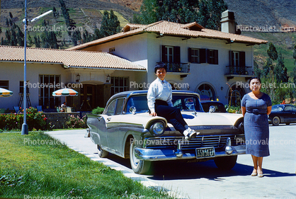 1957 Ford Fairlane 500, 4-door, Sitting Boy, Woman