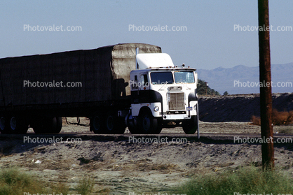 White Freightliner, Salton Sea, flatbed trailer