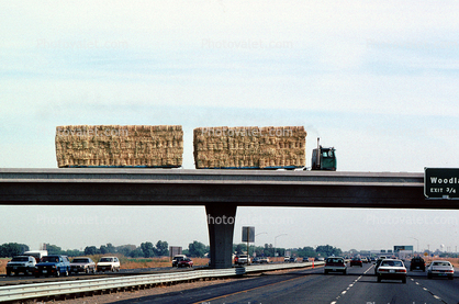 hay bale stacks, Interstate Highway I-5, Semi
