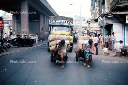 Jal Mistry, Men pulling carts, on the Streets of Mumbai