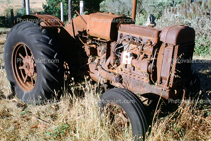 Bolinas, farm tractor rusting, rust