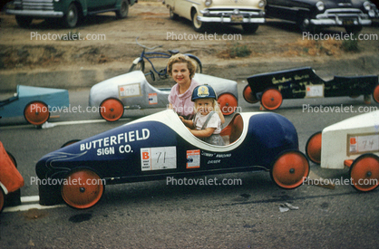 Butterfield Sign Comapany, Mother with Daughter, Girl, female, toddler, racer, 1950s