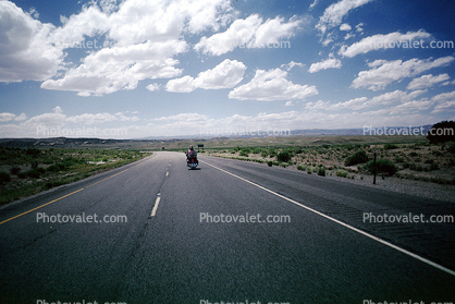 Honda, Man, Woman, Riding, Desert, road, highway, cumulus clouds