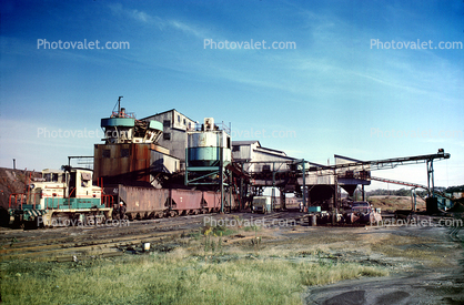 Peabody Coal Company, loading coal, conveyer belts, Macon County Beer Vee Mine, Illinois, 1950s