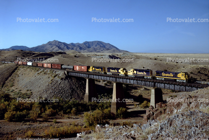 ATSF, Santa-Fe freight crosses Bridge 874.2 at the west end of Abo Canyon east of Sais, New Mexico, October 1992