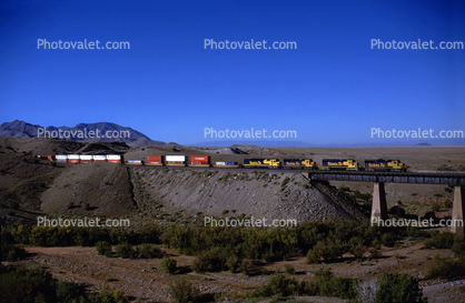 ATSF, Santa-Fe freight crosses Bridge 874.2 at the west end of Abo Canyon east of Sais, New Mexico, October 1995