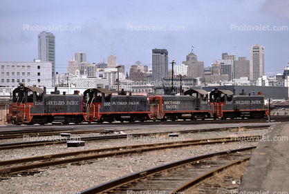 Southern Pacific Railroad Switchers, skyline, buildings, track, Fourth Street Station, June 11 1977