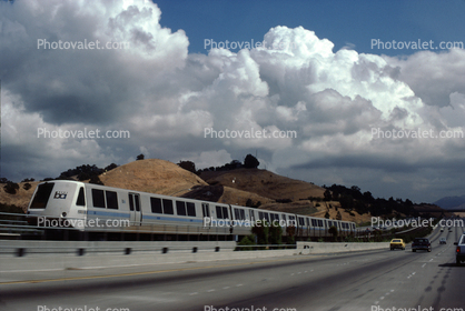 BART train, Bay Area Rapid Transit, Cumulus Clouds, Lafayette, East Bay, Highway 24