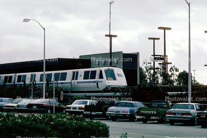 BART train, station, parked cars, Richmond California, November 1988