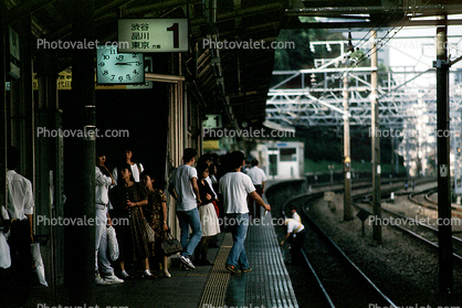 Train Station, crowds, waiting passengers, commuters, platform, clock