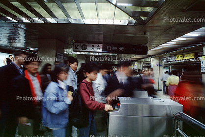 Commuters, entry gates, entering, Seoul