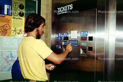 Passenger purchasing a ticket, Bay Area Rapid Transit, BART, Ticket Machine, commuters, 1980s