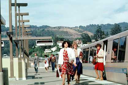 Women Passengers leaving a BART Train, commuters, 1980s