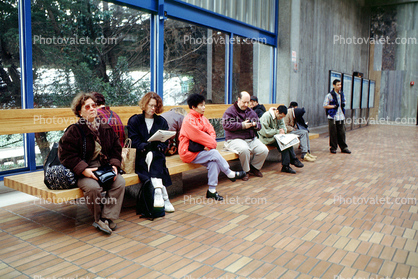 BART station, Passengers Waiting for BART, Sitting, Bench, commuters