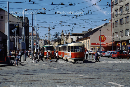 People Walking, Electric Trolley, mcdonald's restaurant, cobblestone street