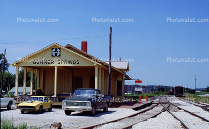 ATSF Railroad Train Station, Depot, Building, Pickup Truck, cars, tracks, Bonner Springs, January 1982, 1980s