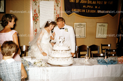 Cake Cutting, Bride and Groom, 1950s