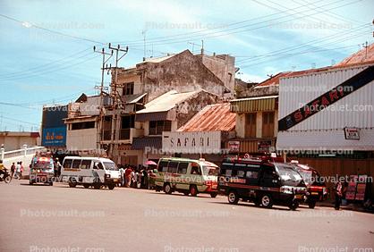 Cars, vans, buildings, Kupang Timor