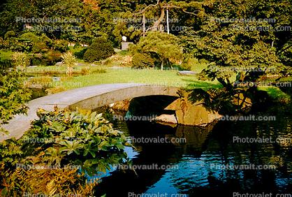 arch foot bridge, Gardens, 1950s