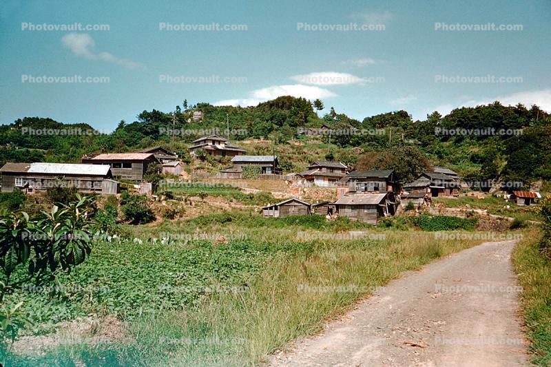 Village, Homes, buildings, dirt road, hill, Sasebo Saga, unpaved, 1950s