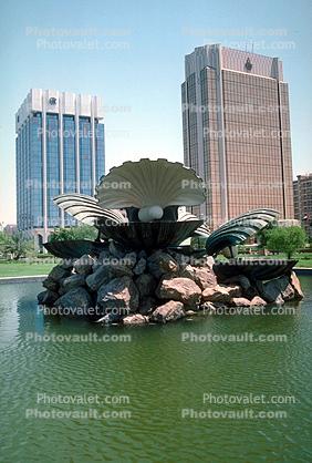 Clamshell Water Fountain, aquatics, highrise buildings, rocks, Abu Dhabi, United Arab Emirates