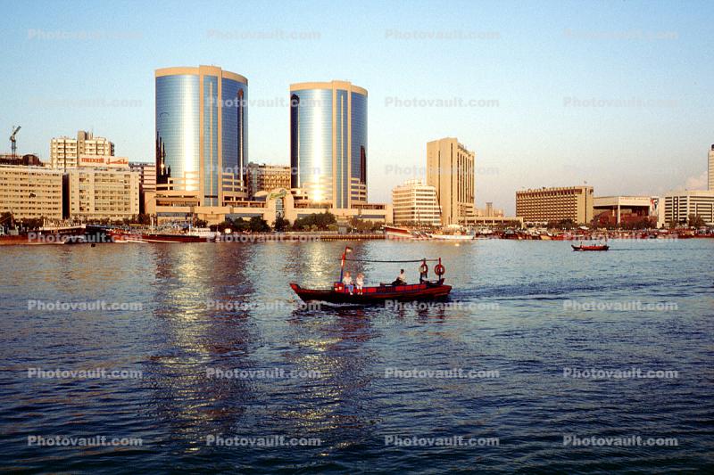 Deira Twin Towers, Dubai Creek, Waterfront, shoreline, buildings, boat, UAE, United Arab Emirates