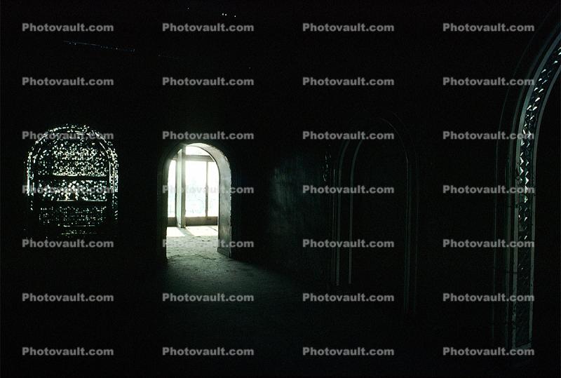 Inside a dark room, doorway, entryway