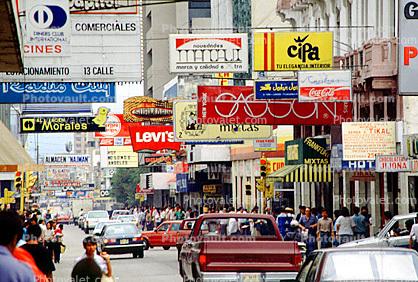 Overdose of billboards, Guatemala City, cars, automobiles, vehicles, 1970s