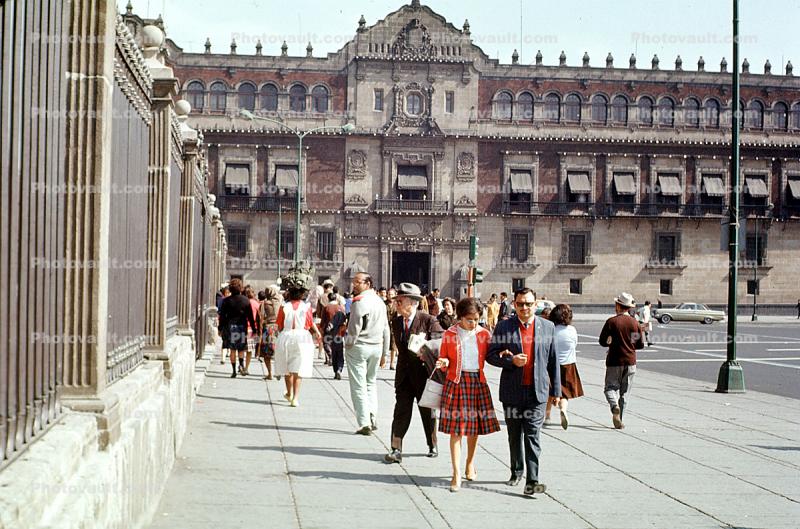 Palacio Nacional (National Palace), sidewalk, woman, man, dress, suit, government building, couple, Zocalo