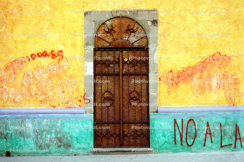 Colorful Walls and a Rust Iron Door