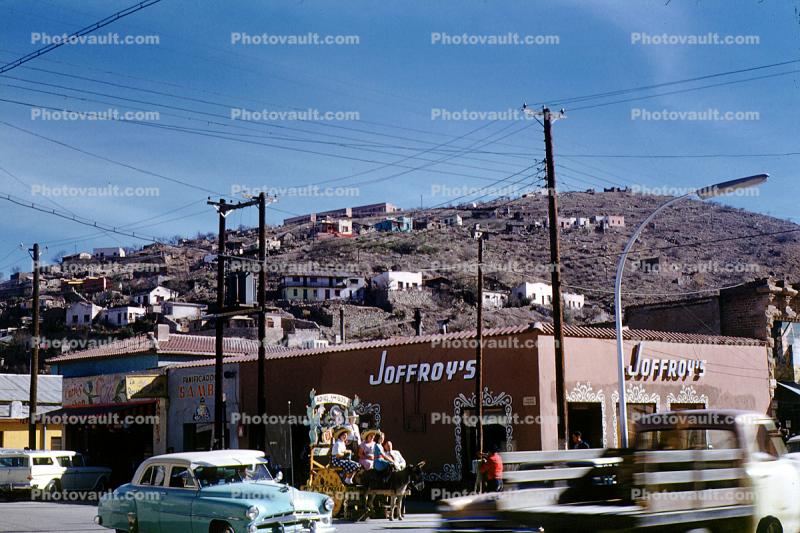 Joffroy's store, Mule Photo Studio, Cars, shops, stores, Homes on a hill, houses, buildings, 1950s