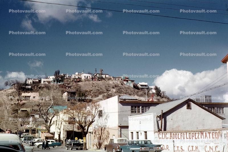 Cars, shops, stores, Homes on a hill, houses, buildings, 1950s