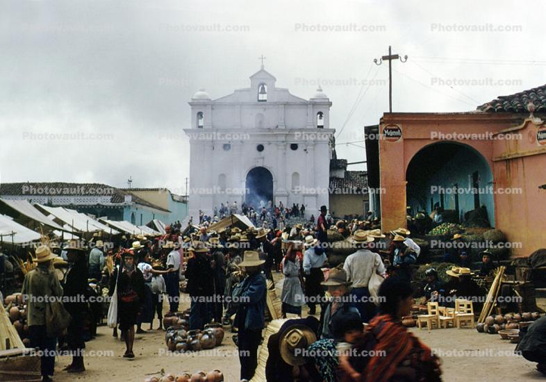 Crowds of People at an Open Air Market in Peru, Smoke, Cross, Church Square