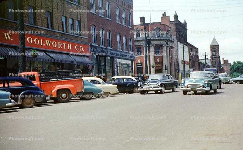 Cars, stores, FW Woolworth, Downtown Charlottetown, Prince Edward Island, PEI, July 1957, 1950s