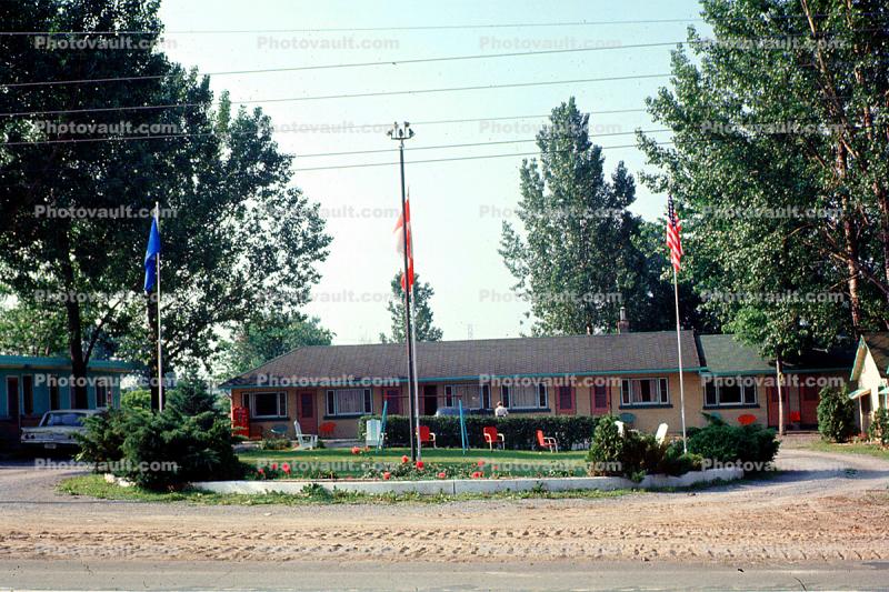 Motel, building, flags, Mercury Comet, 1960s