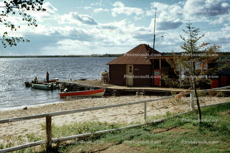 Dock, boats, Cabins, footpath, buildings, beach, sand, fence, God's Lake Lodge, Manitoba, Canada