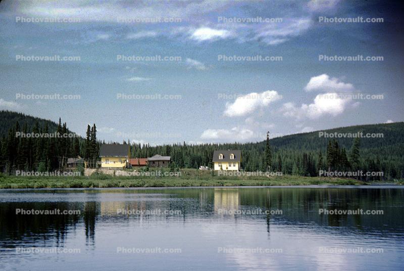 Homes, house, buildings, lake reflection, clouds, 1966, 1960s