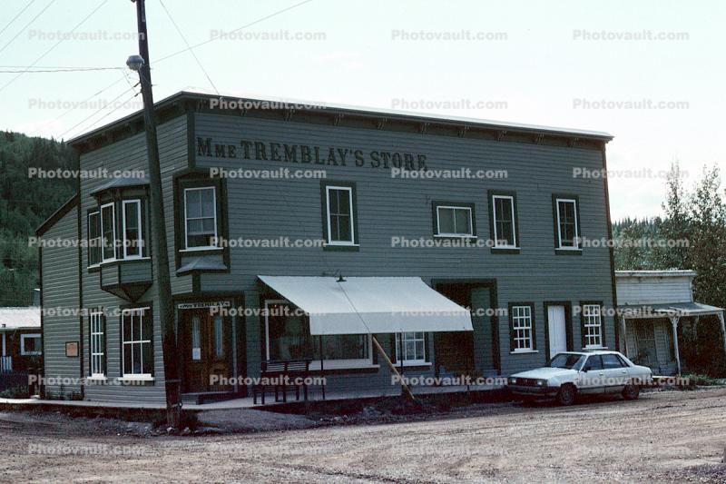 Tremblay's Store, awning, car, dirt road, building, Dawson City