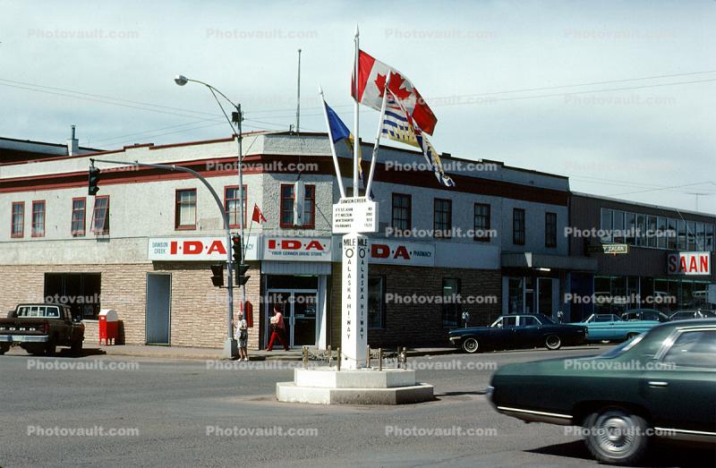 IDA, Alaska Highway, cars, buildings, Dawson City, 1960s