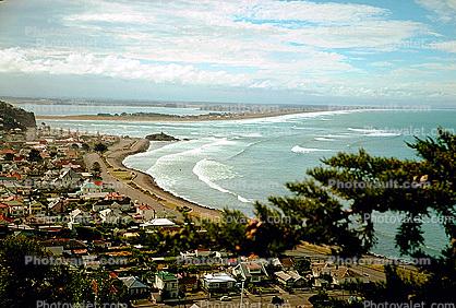 Homes, houses, beach, waves, inlet, bay, Christchurch, 1950s