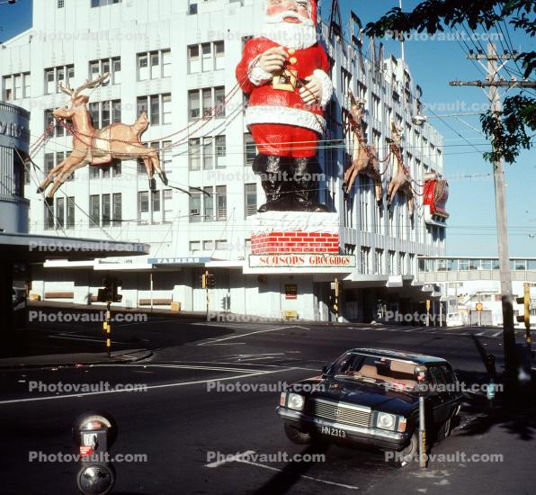 Santa Claus, reindeer, statue, building, sled