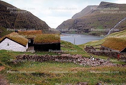village, sod houses, sod roofs, inlet, mountains, grass, stone wall, fjord, Buildings